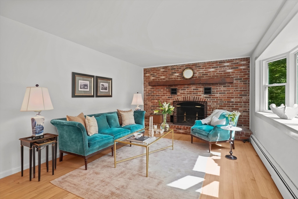 50 Middle Road Amesbury, MA 01913 - Photo 3 of 30 a living room with furniture and a fireplace