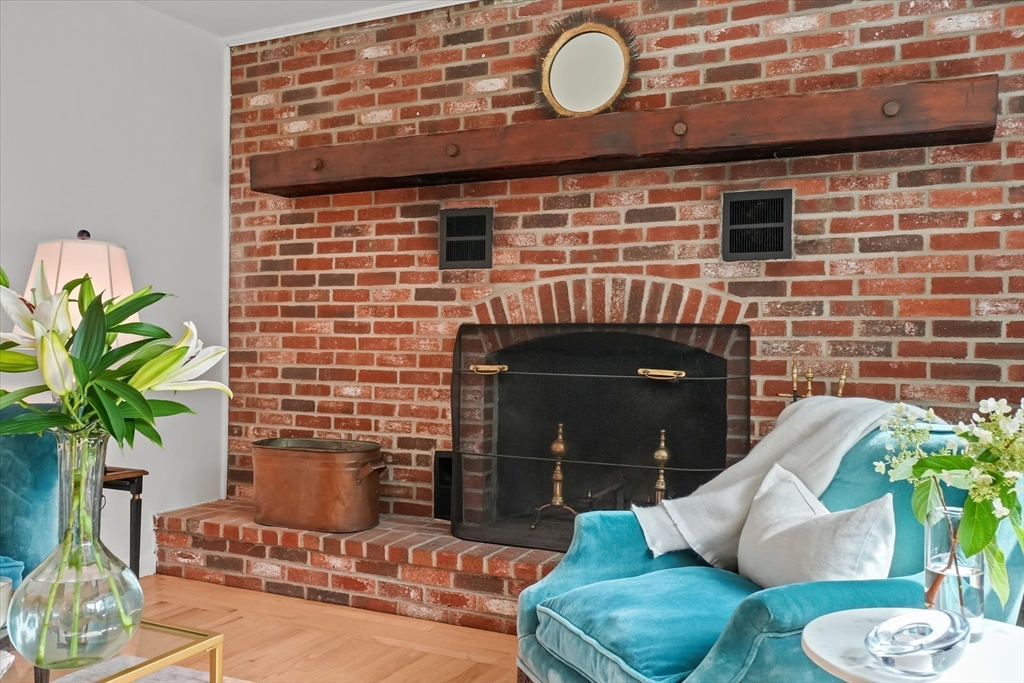 50 Middle Road Amesbury, MA 01913 - Photo 4 of 30 a fireplace with wooden floor