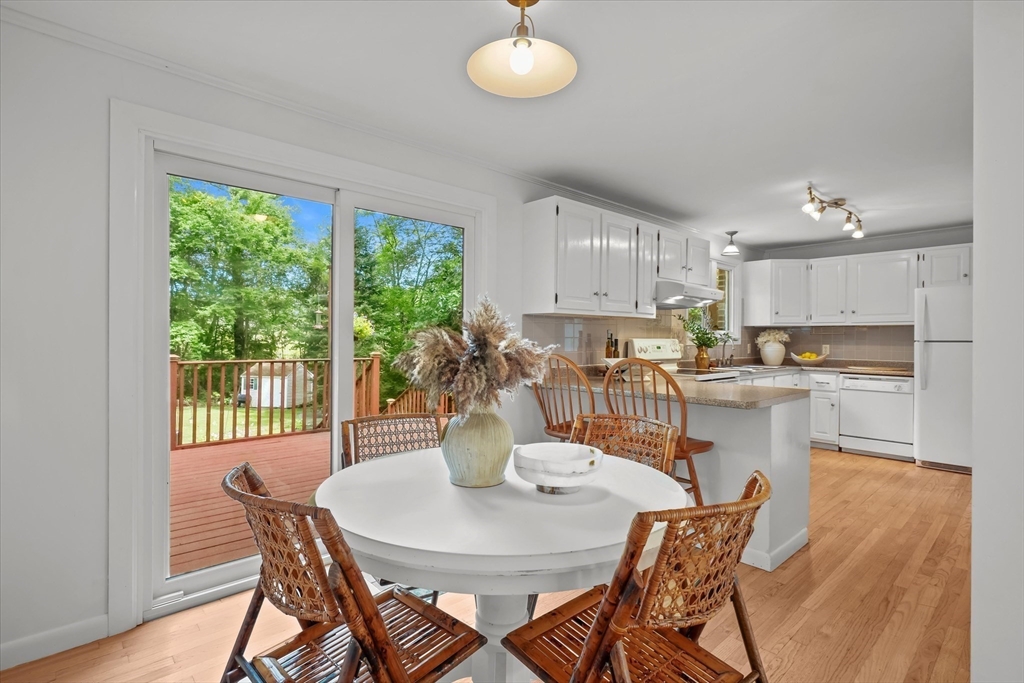 50 Middle Road Amesbury, MA 01913 - Photo 5 of 30 a kitchen with dining table and chairs