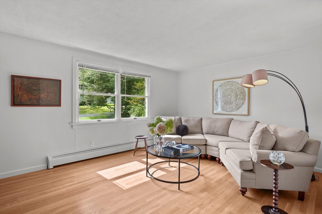 50 Middle Road Amesbury, MA 01913 - Photo 9 of 30 a living room with furniture and a window