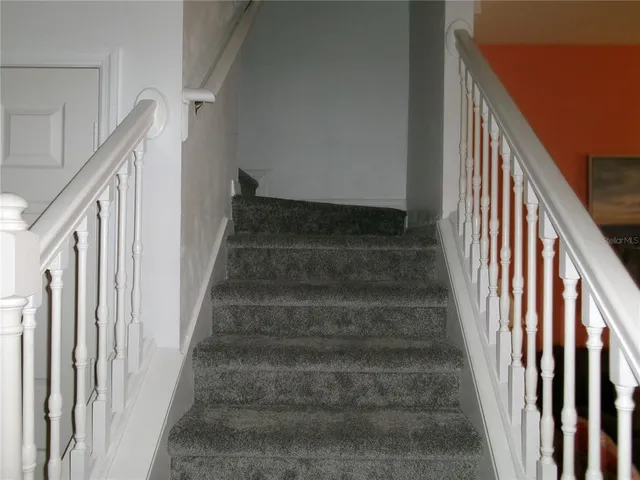 a view of a livingroom with furniture and a couch