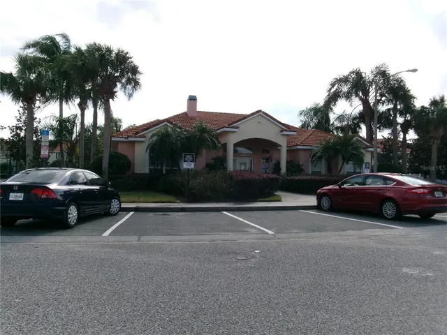 a bathroom with a granite countertop sink a mirror and vanity