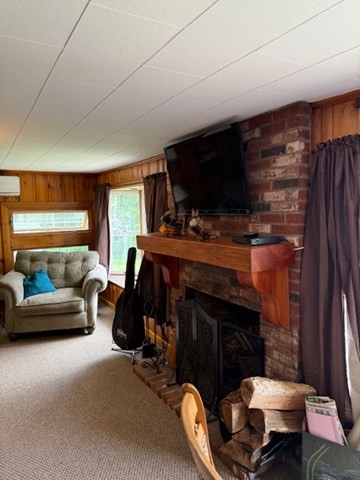 45 Spring Street Lunenburg, MA 01462 - Photo 7 of 14 a living room with furniture a flat screen tv and a fireplace