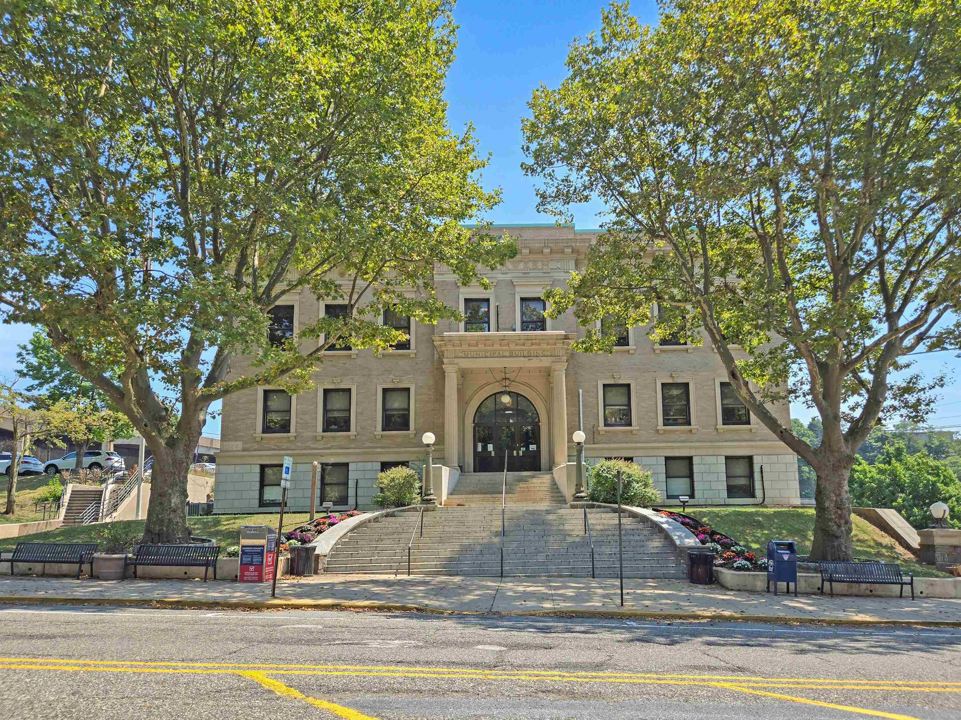 55 Hackensack Plank Road Weehawken, NJ 07086 - Photo 12 of 19 a view of a big house with fountain in front of it