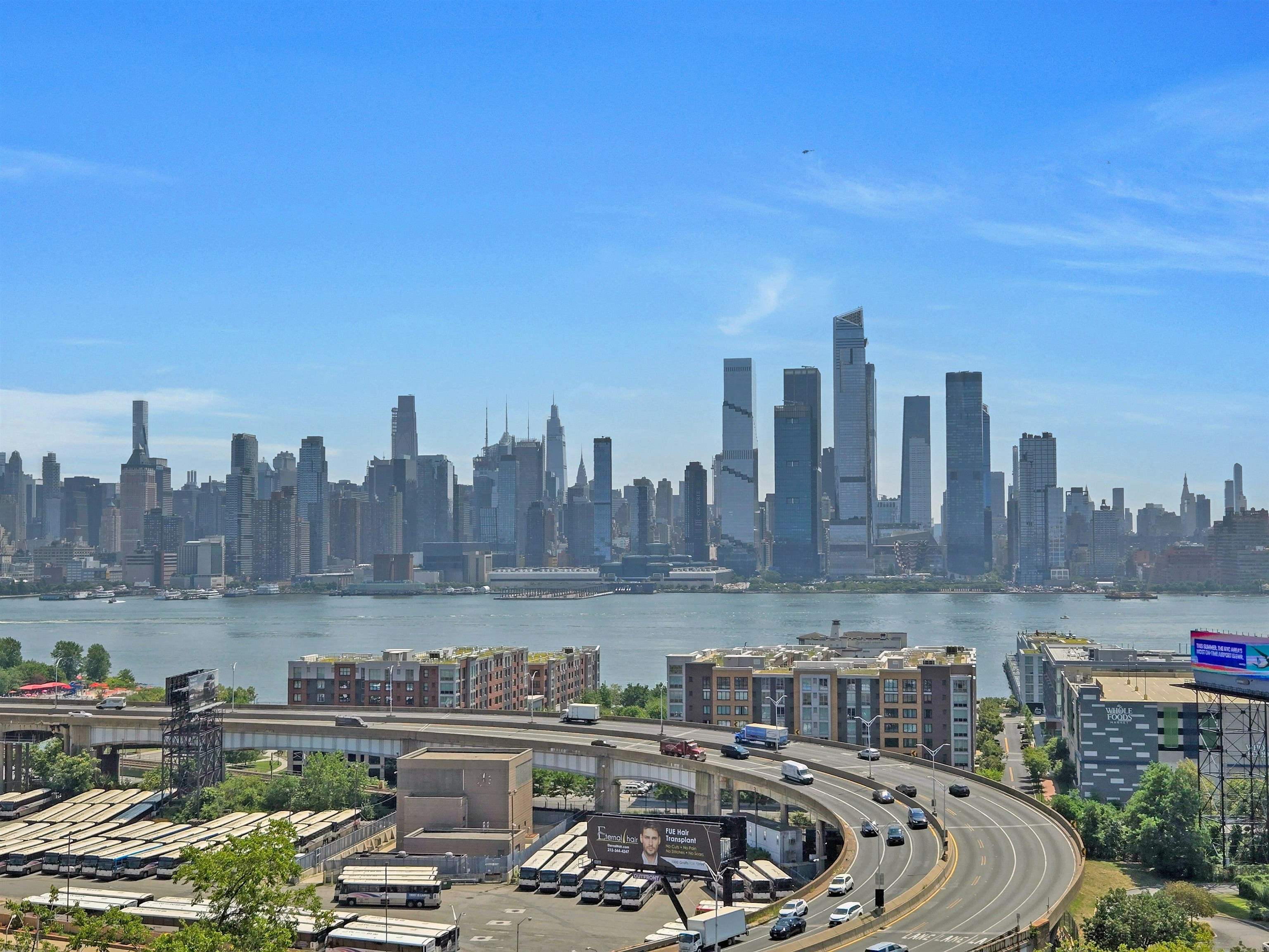 55 Hackensack Plank Road Weehawken, NJ 07086 - Photo 18 of 19 a view of city and a lake