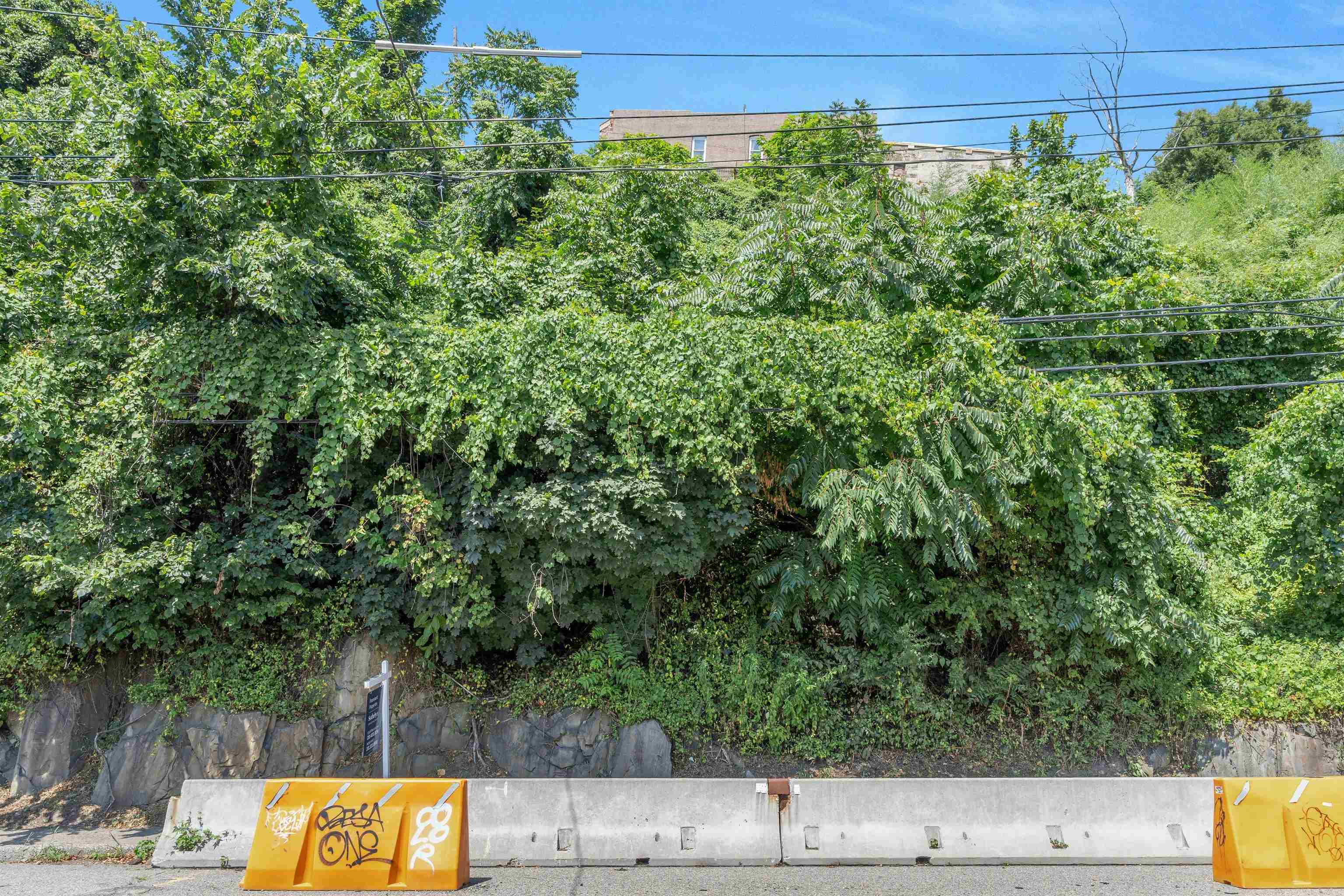 55 Hackensack Plank Road Weehawken, NJ 07086 - Photo 4 of 19 a view of car parked on road