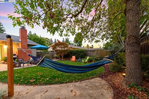 a wooden fence with some plants