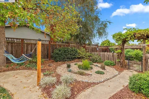 an aerial view of a house and a yard