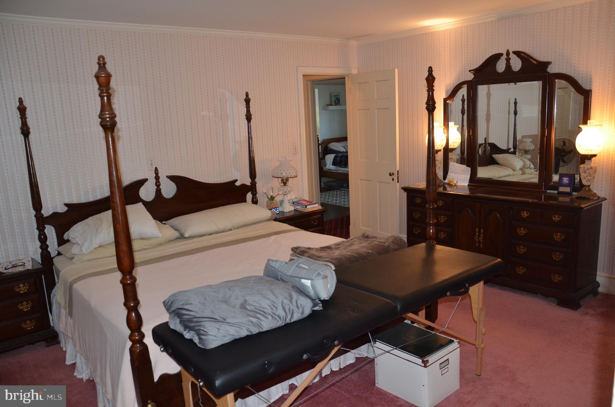 9020 Bozman Neavitt Road St. Michaels, MD 21663 - Photo 18 of 32 Downstairs Bedroom