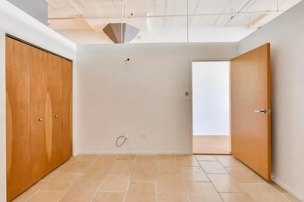 a view of an empty room and window