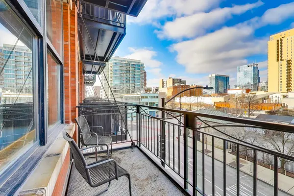 a view of balcony with furniture