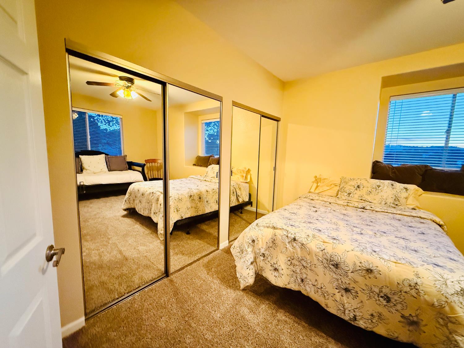 611 Sunrise Road Copperopolis, CA 95228 - Photo 23 of 29 a bedroom with a bed and wooden floor
