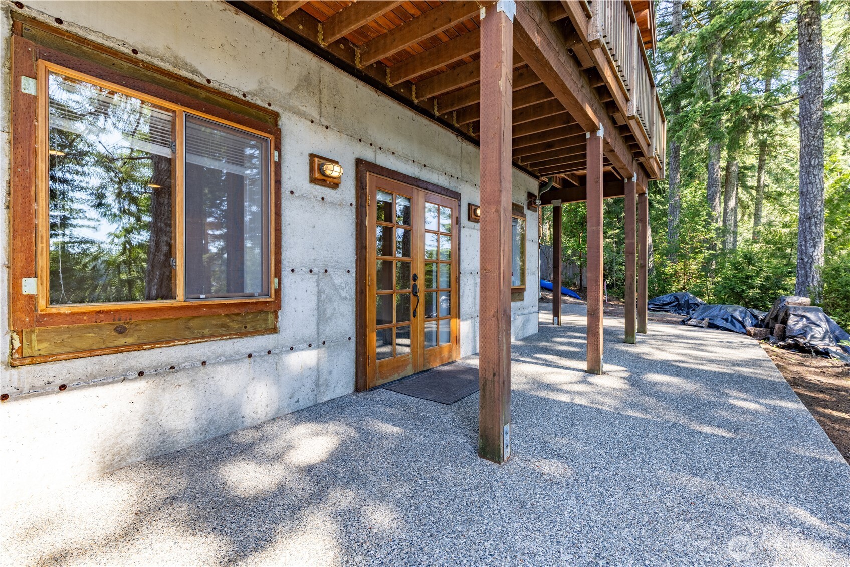 1901 E Trail Belfair, WA 98528 - Photo 25 of 40 a view of a house with a porch