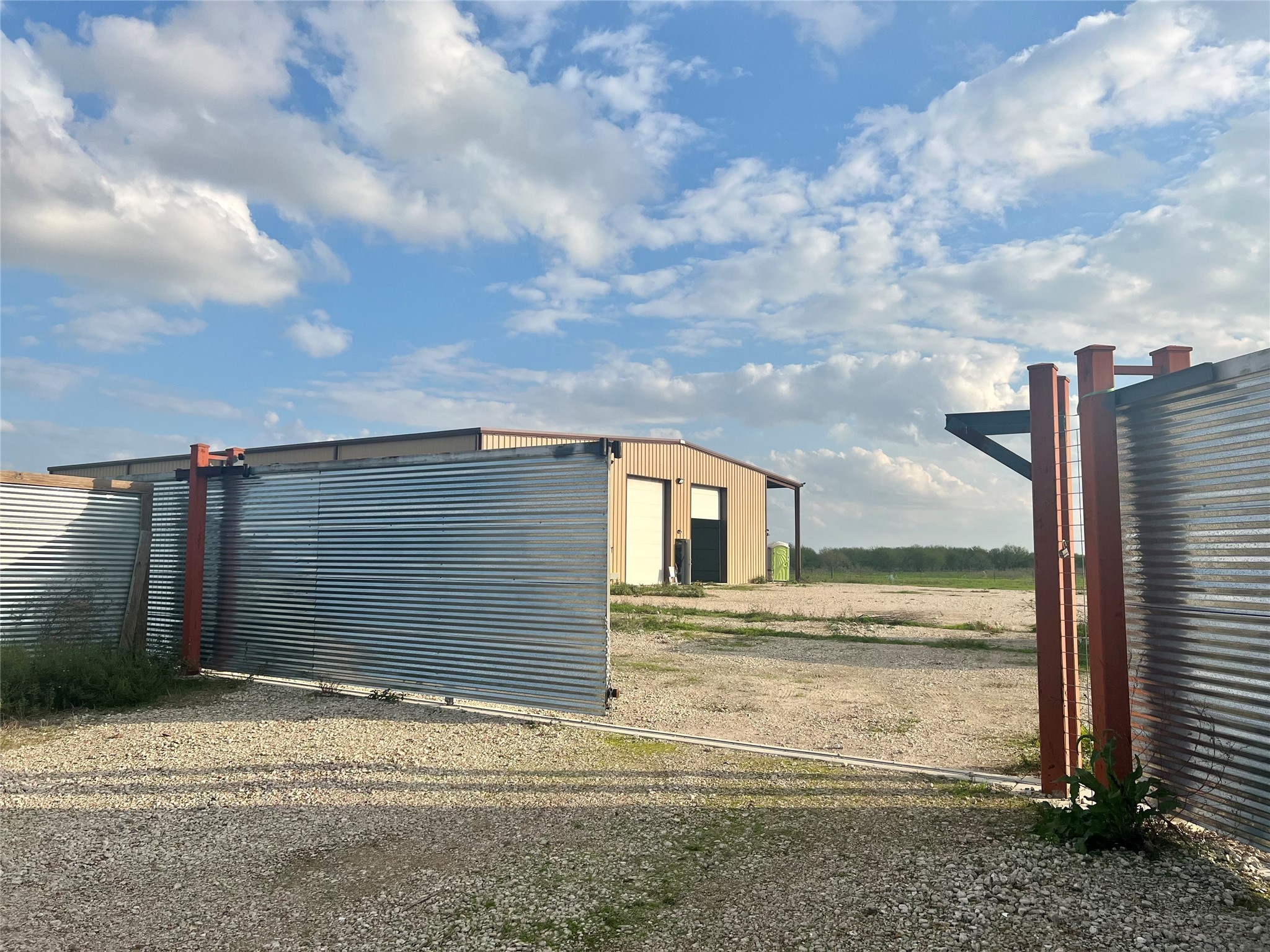 36847 Richard Frey Road Hempstead, TX 77445 - Photo 9 of 24 a view of a terrace next to a building