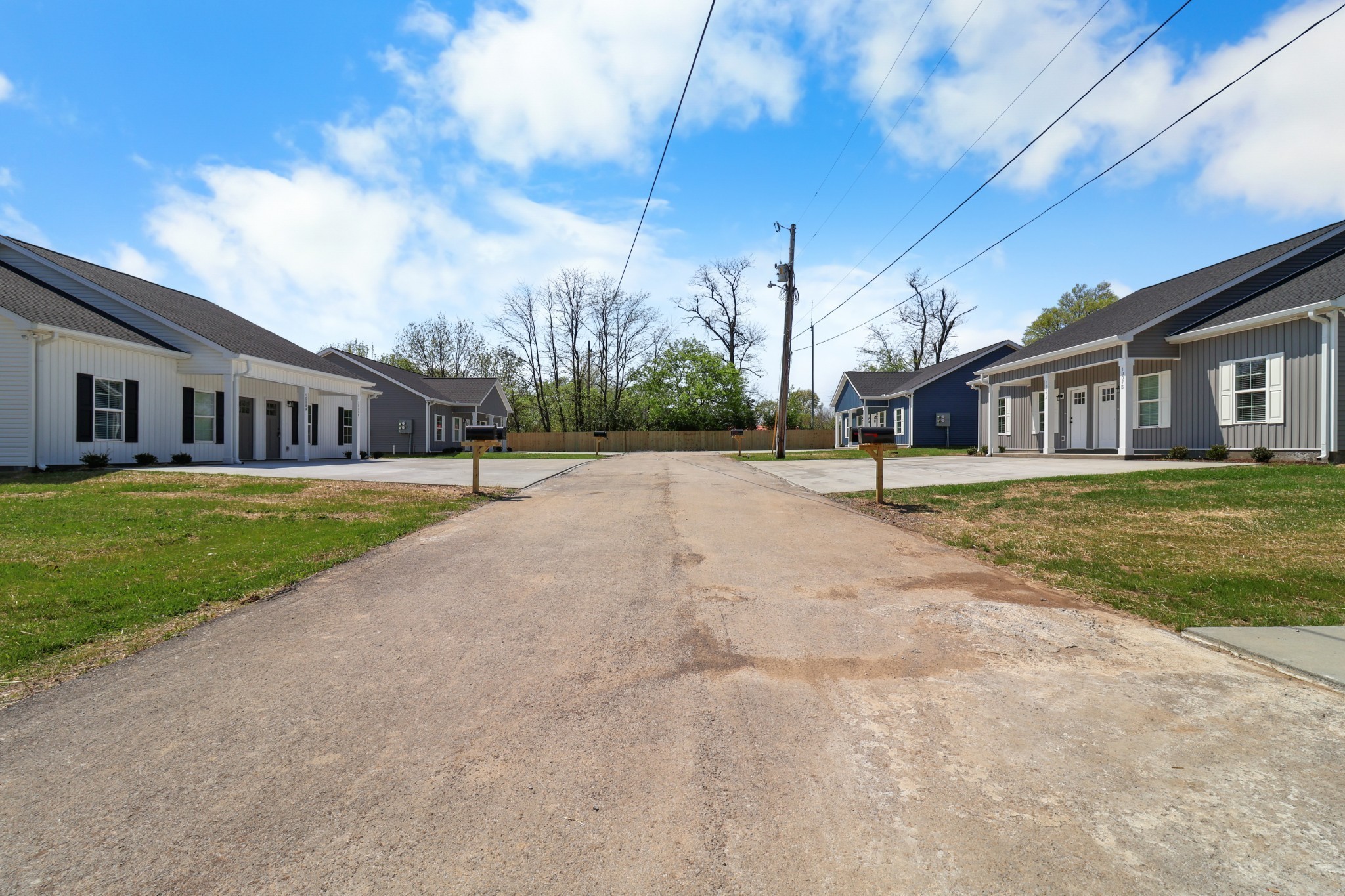 1007 Oak Street, Unit A Portland, TN 37148 - Photo 27 of 29 a view of a house with a yard and sitting area