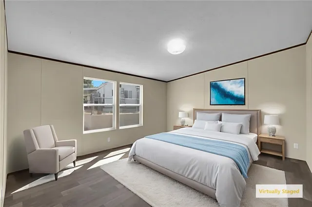 a bedroom with a bed and a couch