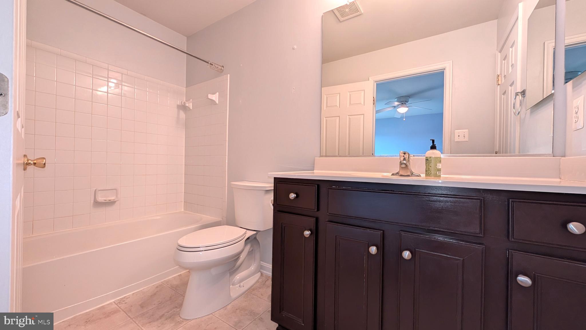 230 Whitman Lane Inwood, WV 25428 - Photo 17 of 29 a bathroom with a sink a toilet and shower