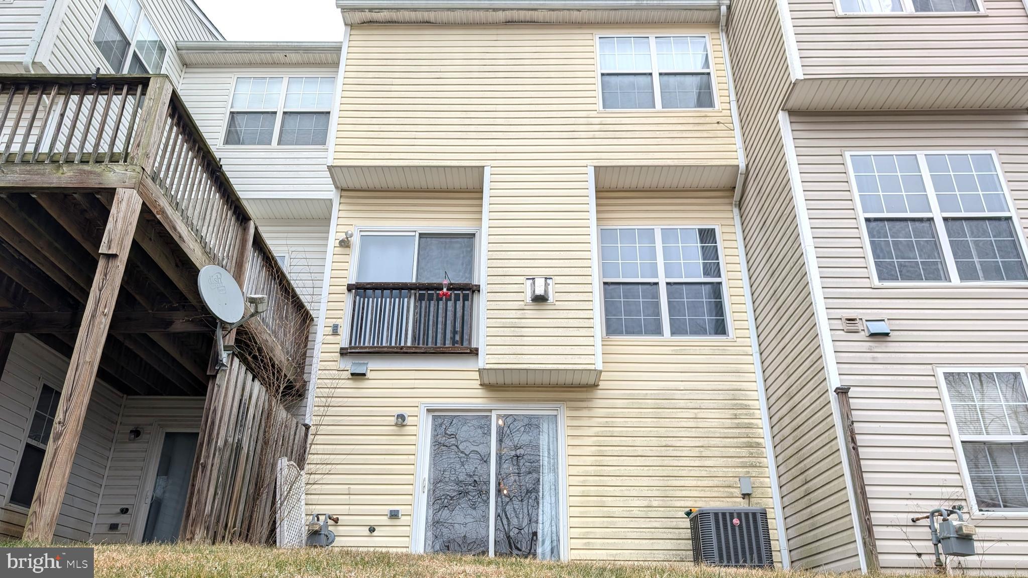 230 Whitman Lane Inwood, WV 25428 - Photo 27 of 29 a view of front door of house with wooden stairs
