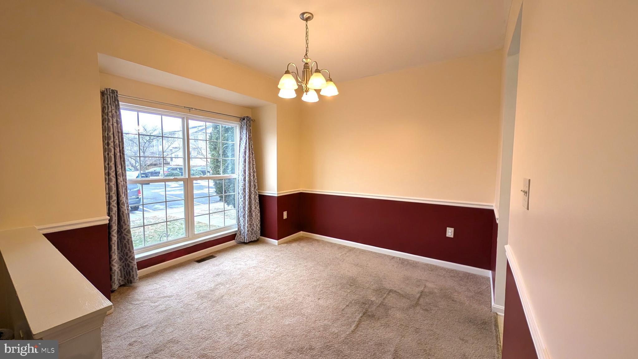 230 Whitman Lane Inwood, WV 25428 - Photo 5 of 29 a view of an empty room with a window