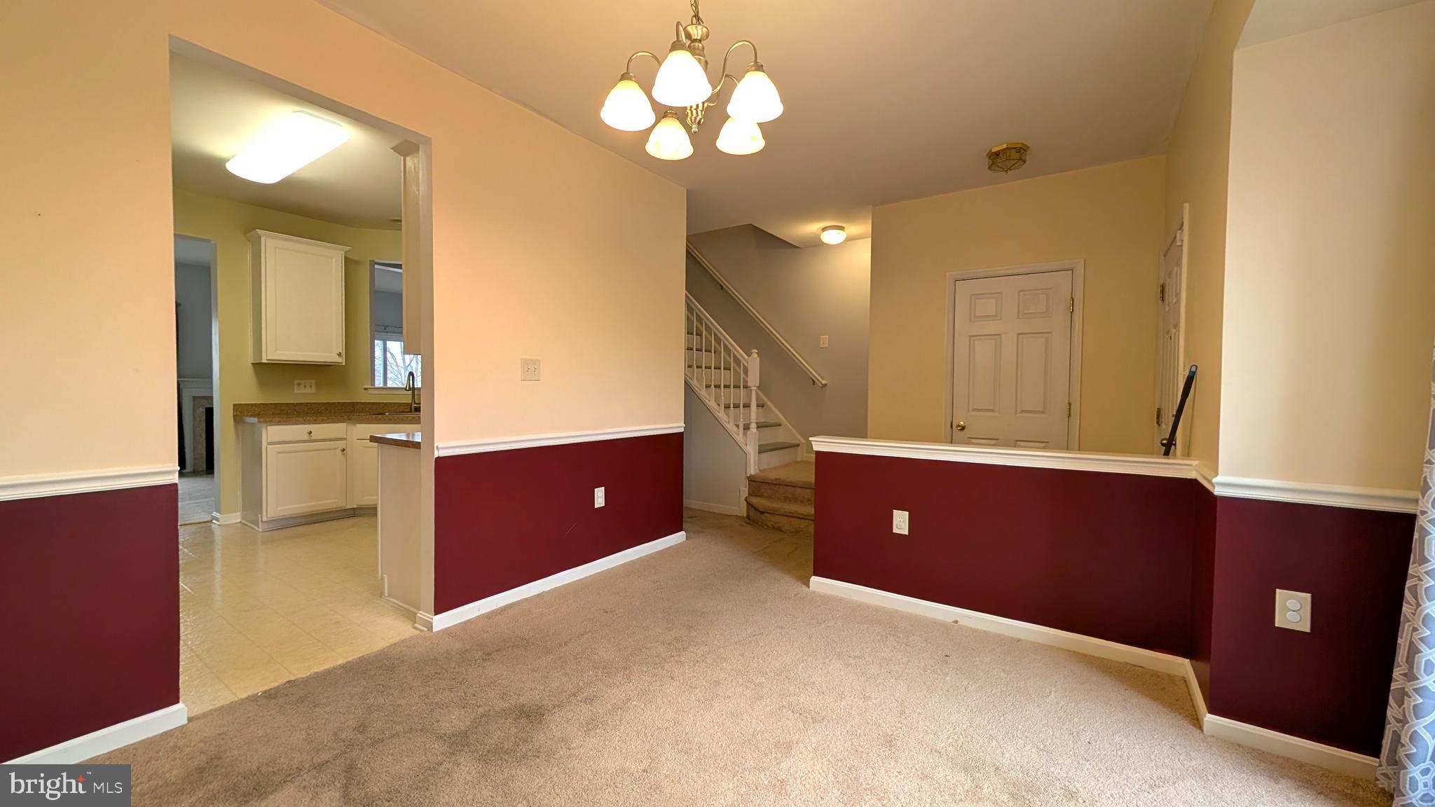 230 Whitman Lane Inwood, WV 25428 - Photo 6 of 29 a kitchen with cabinets and window