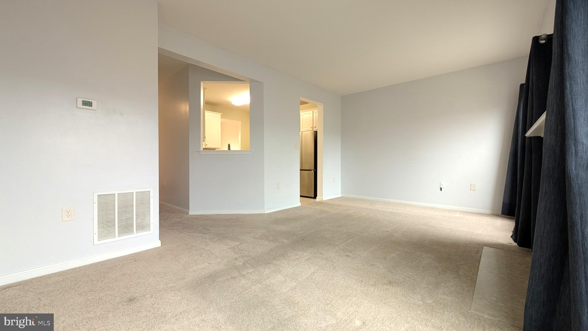 230 Whitman Lane Inwood, WV 25428 - Photo 9 of 29 a view of an empty room with a window