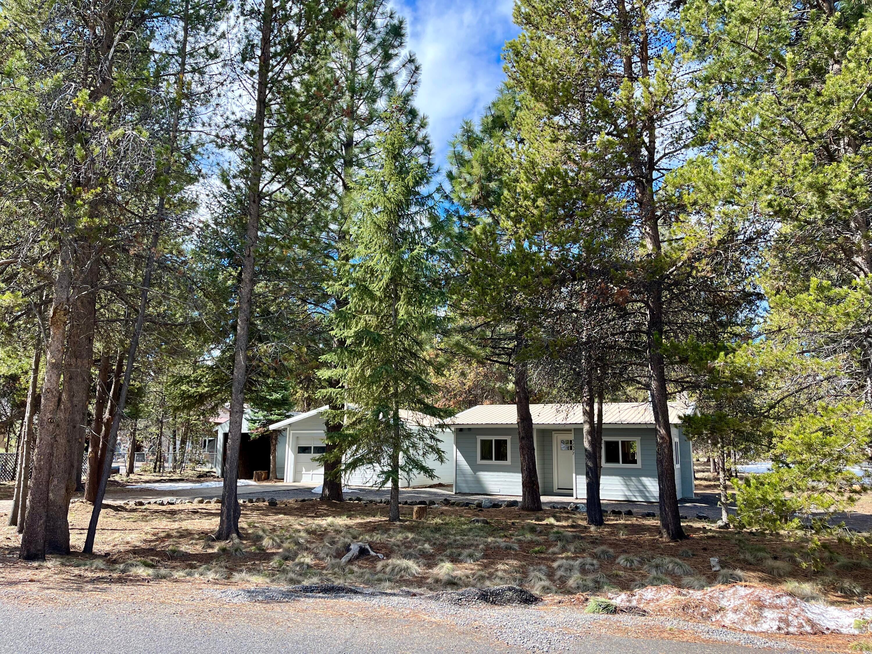 52577 River Pine Road La Pine, OR 97739 - Photo 25 of 25 Peaceful River Pine neighborhood setting with paved road approach.
