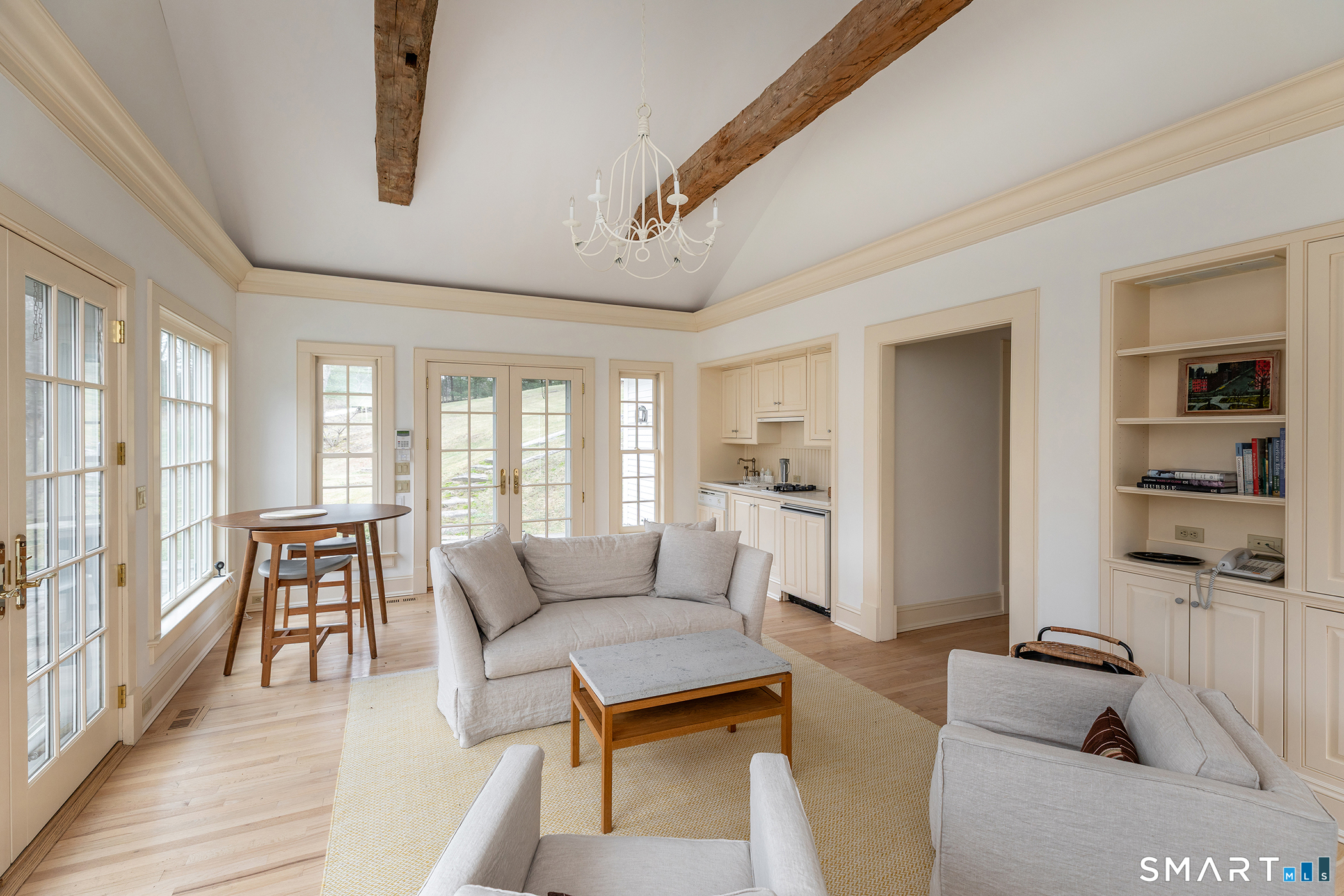 47 Squire Road Roxbury, CT 06783 - Photo 19 of 27 a living room with furniture and a table