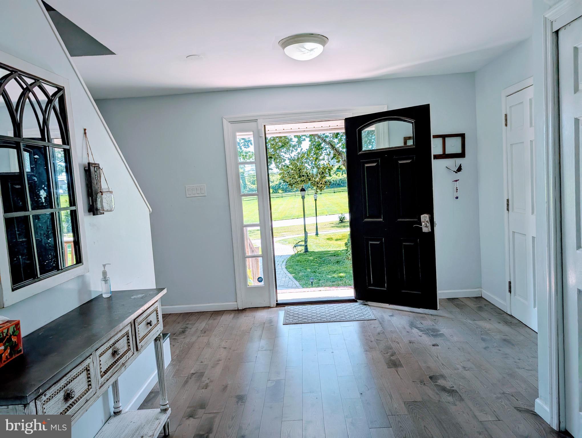 2601 Wayland Road Berwyn, PA 19312 - Photo 4 of 8 wooden floor in an empty room with a window
