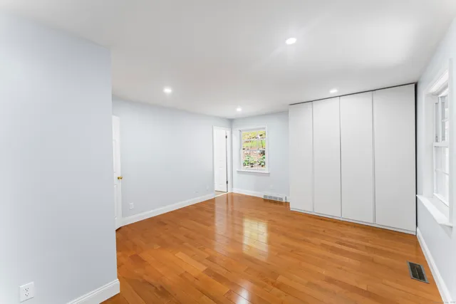 a bathroom with a bathtub and a toilet