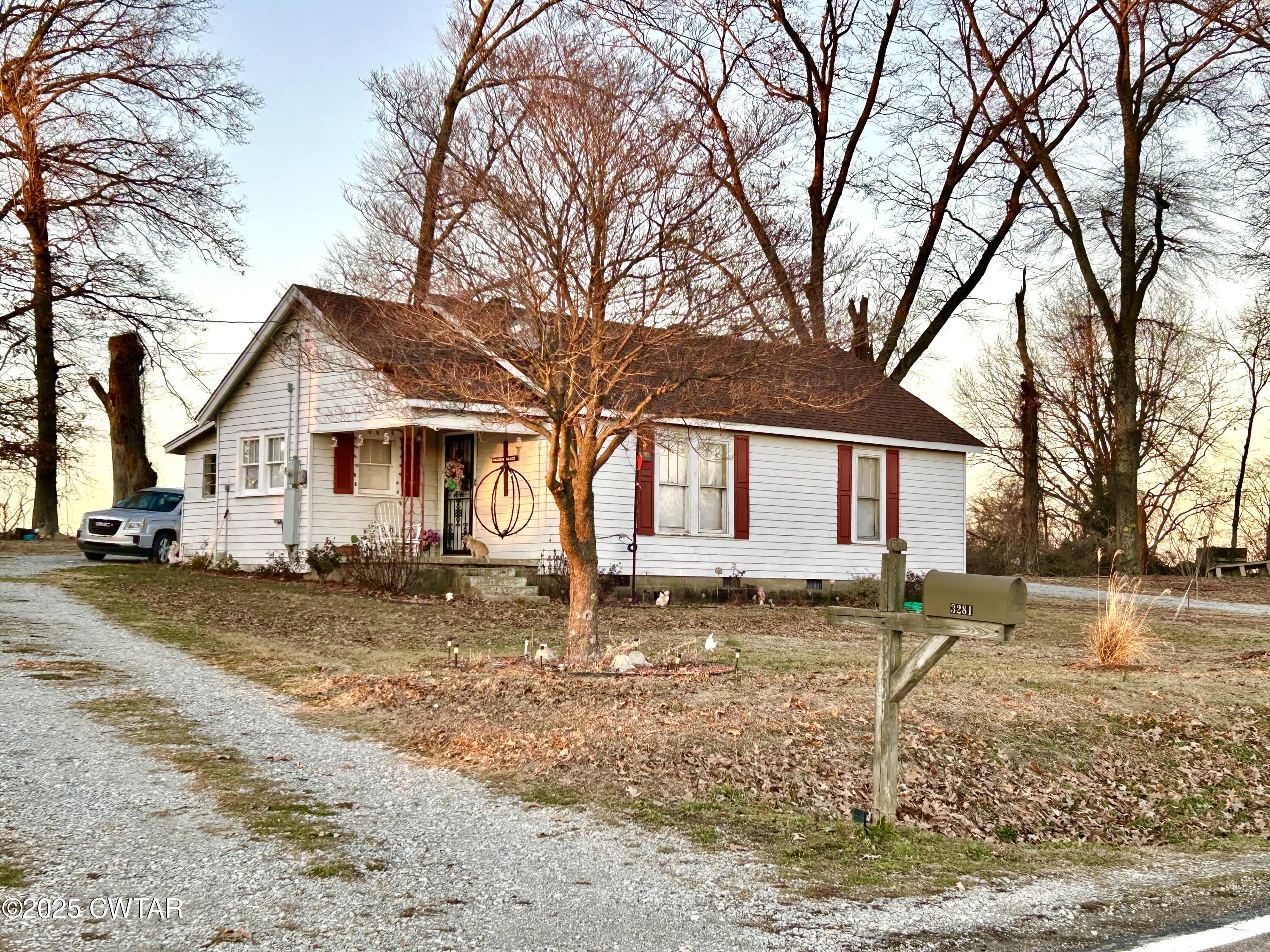 3281 Forked Deer Road Gates, TN 38037 - Photo 1 of 7 a front view of a house with a yard