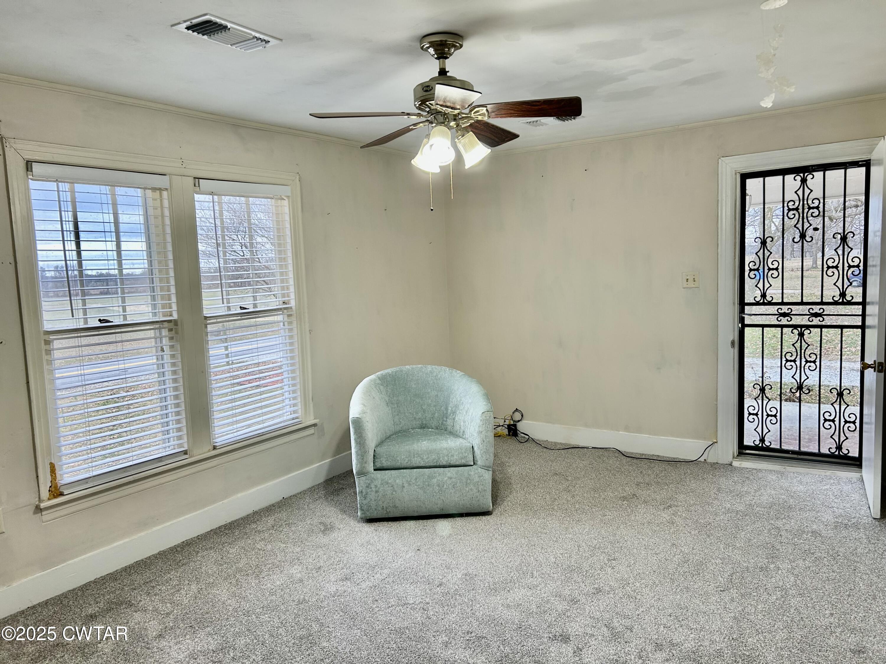 3281 Forked Deer Road Gates, TN 38037 - Photo 3 of 7 a living room with furniture and a window