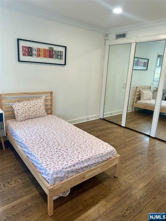 440 Bogert Road River Edge, NJ 07661 - Photo 14 of 25 a bed sitting in a bedroom next to a window