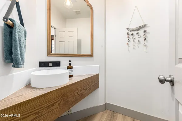 a bathroom with a bathtub and a sink