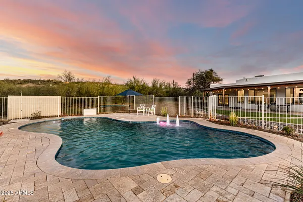 a view of a house with a big yard