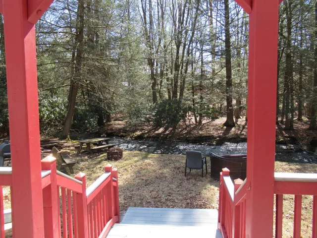 a view of swimming pool with a yard