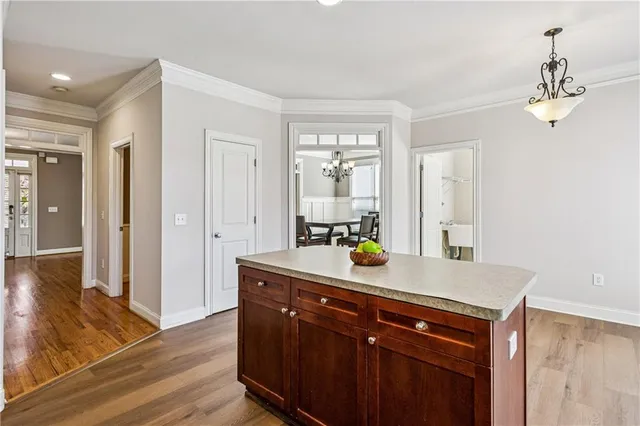 a room with a sink and a mirror