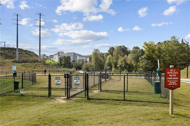 a view of a swimming pool with a lake view