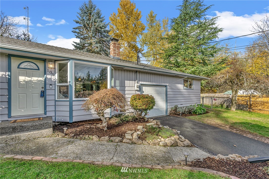 105 232nd Place Southwest Bothell, WA 98021 - Photo 2 of 39 a view of a back yard of the house