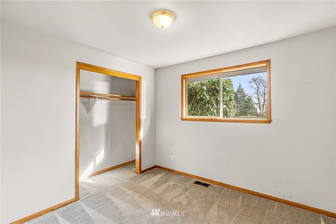 105 232nd Place Southwest Bothell, WA 98021 - Photo 25 of 39 a view of an empty room with a window