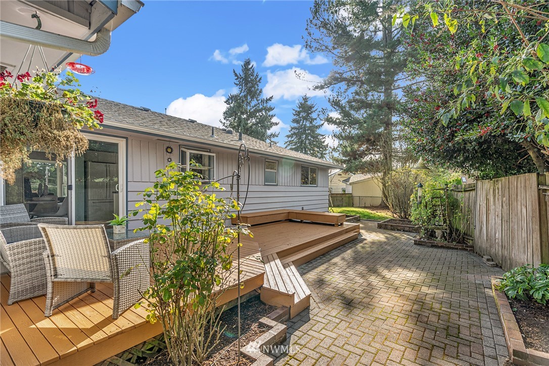 105 232nd Place Southwest Bothell, WA 98021 - Photo 29 of 39 a view of a house with backyard and sitting area