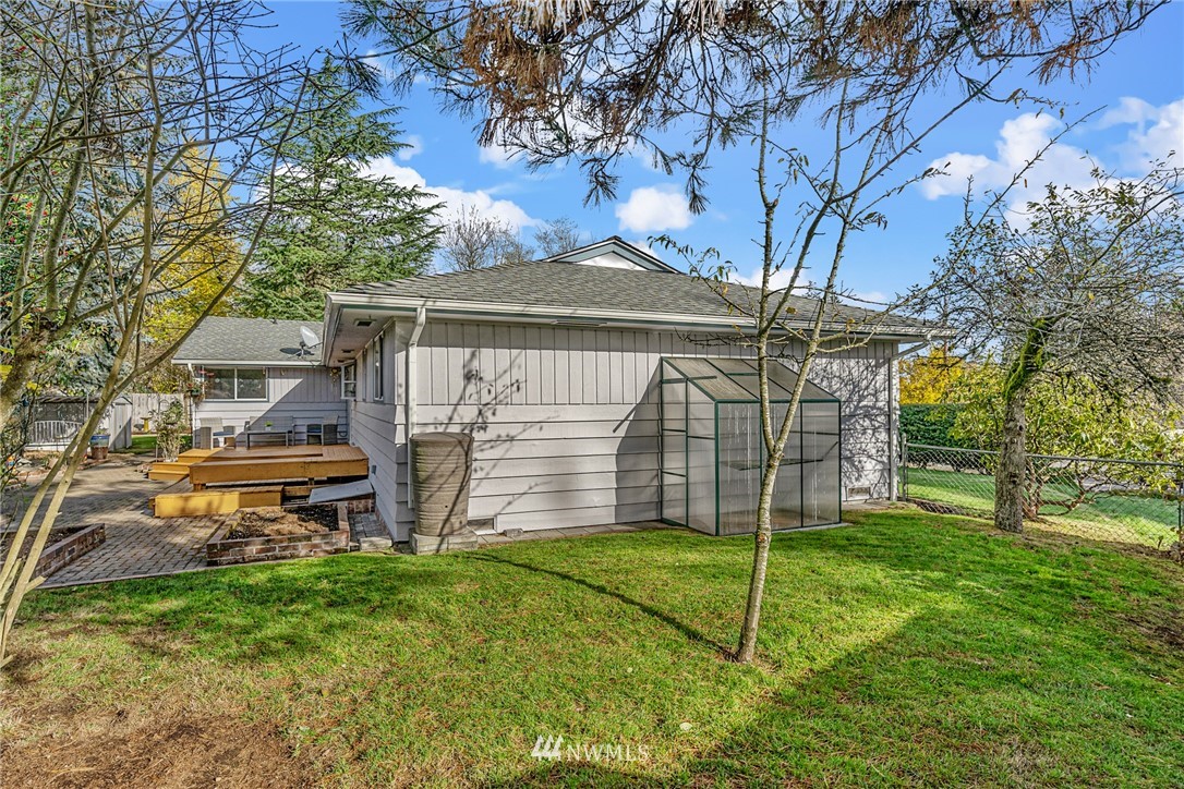 105 232nd Place Southwest Bothell, WA 98021 - Photo 31 of 39 a view of a backyard with a tree