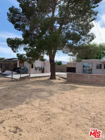 a view of house with outdoor space