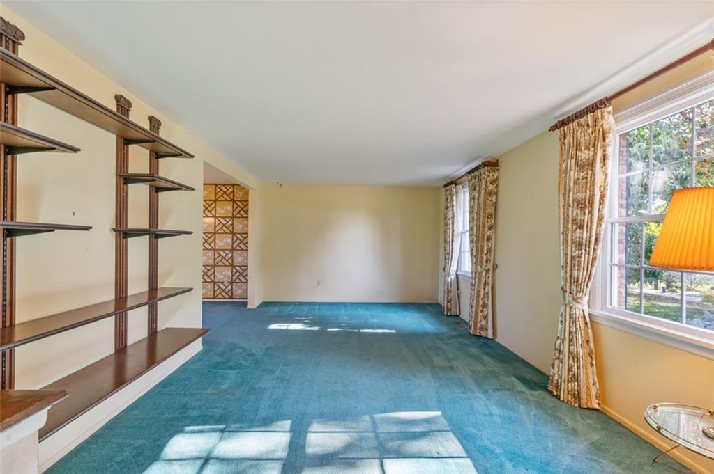 Sunlight streams through replacement Andersen windows.