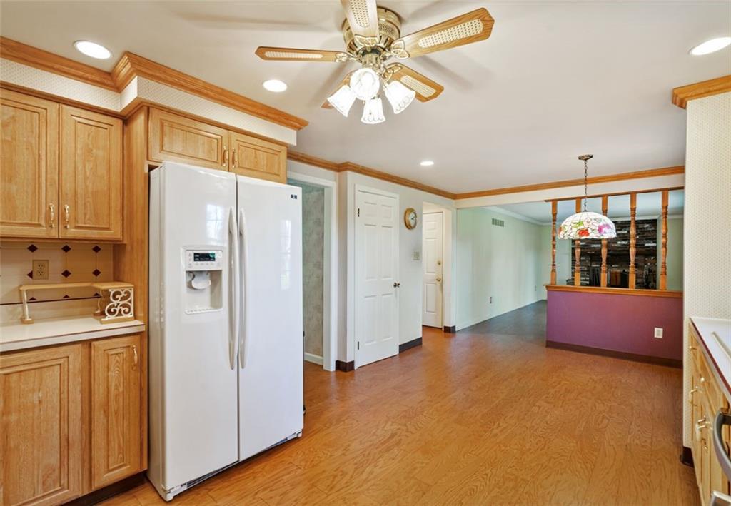 1439 Old Meadow Road Pittsburgh, PA 15241 - Photo 8 of 27 Wood flooring starts at the entry and continues here.