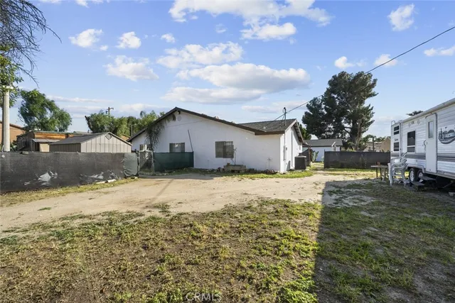 a swimming pool view with a outdoor seating