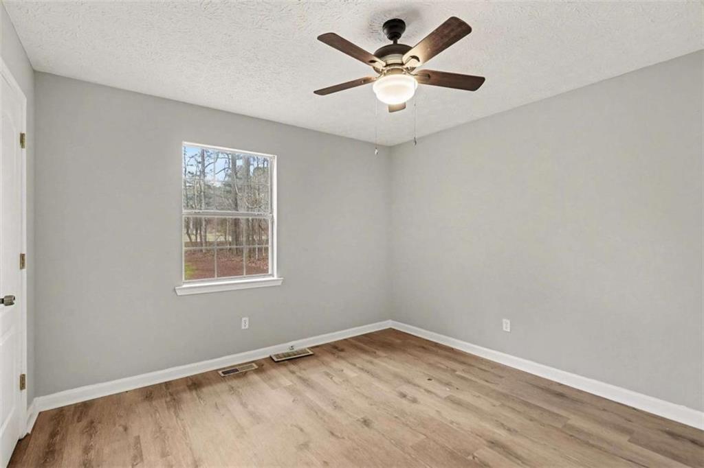 253 Ruth Drive Newnan, GA 30265 - Photo 21 of 25 an empty room with a window