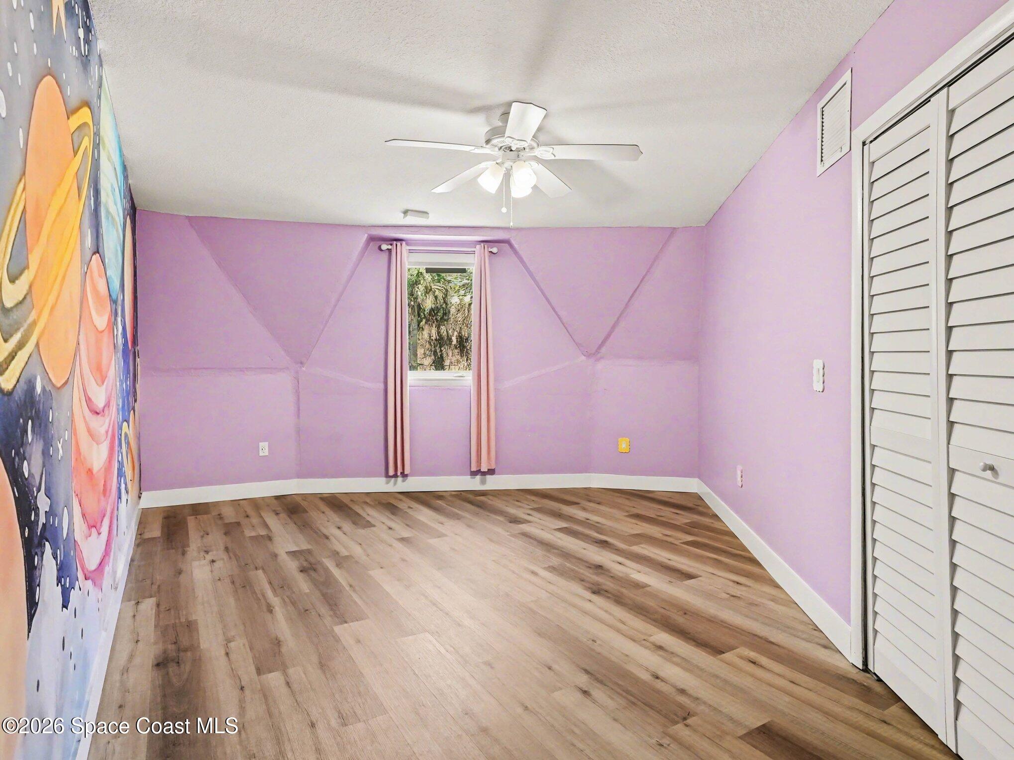 4045 Jake Avenue Cocoa, FL 32926 - Photo 10 of 35 a view of room with window and ceiling fan