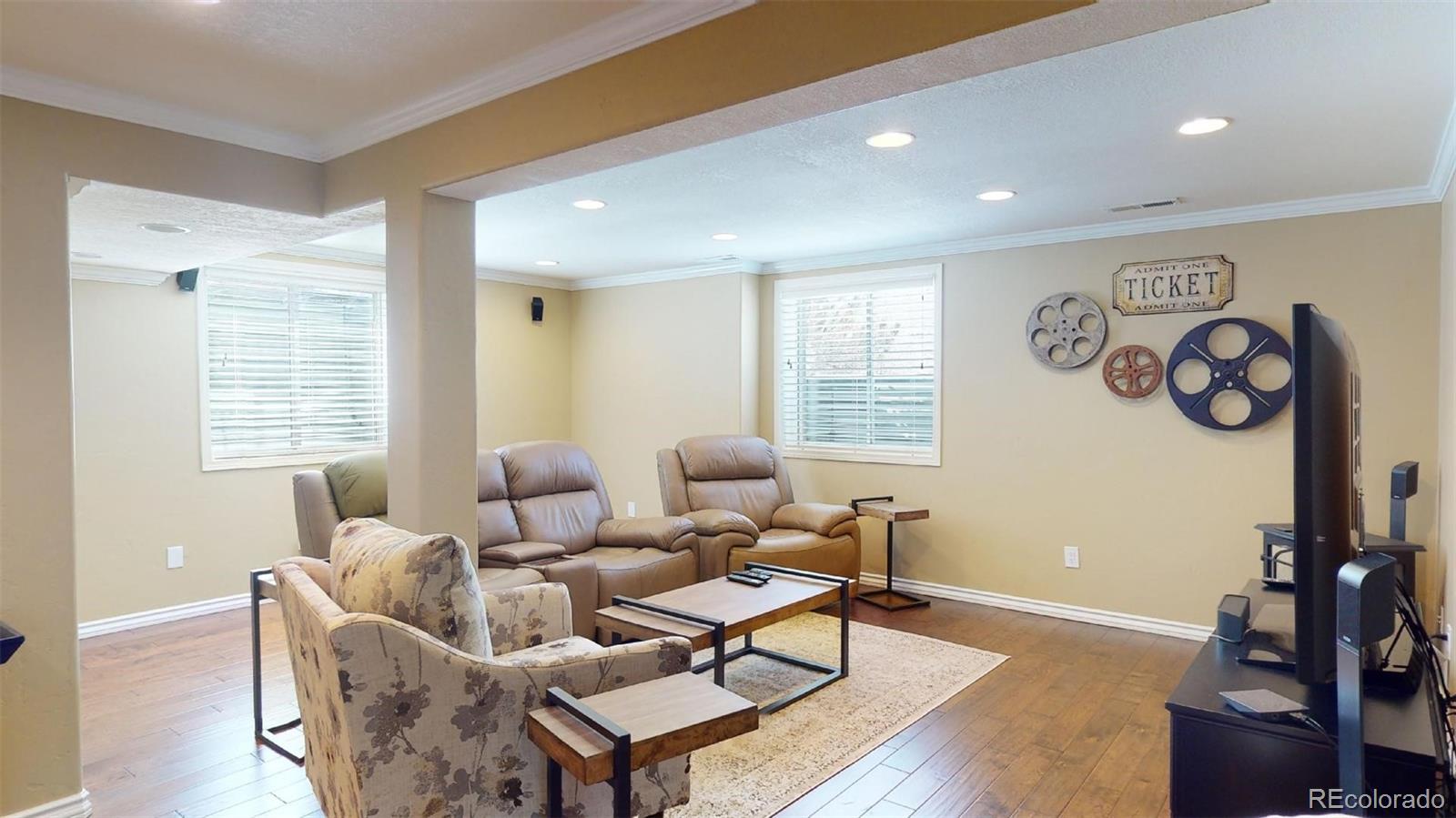 599 Timbervale Trail Highlands Ranch, CO 80129 - Photo 24 of 32 a living room with furniture and a window