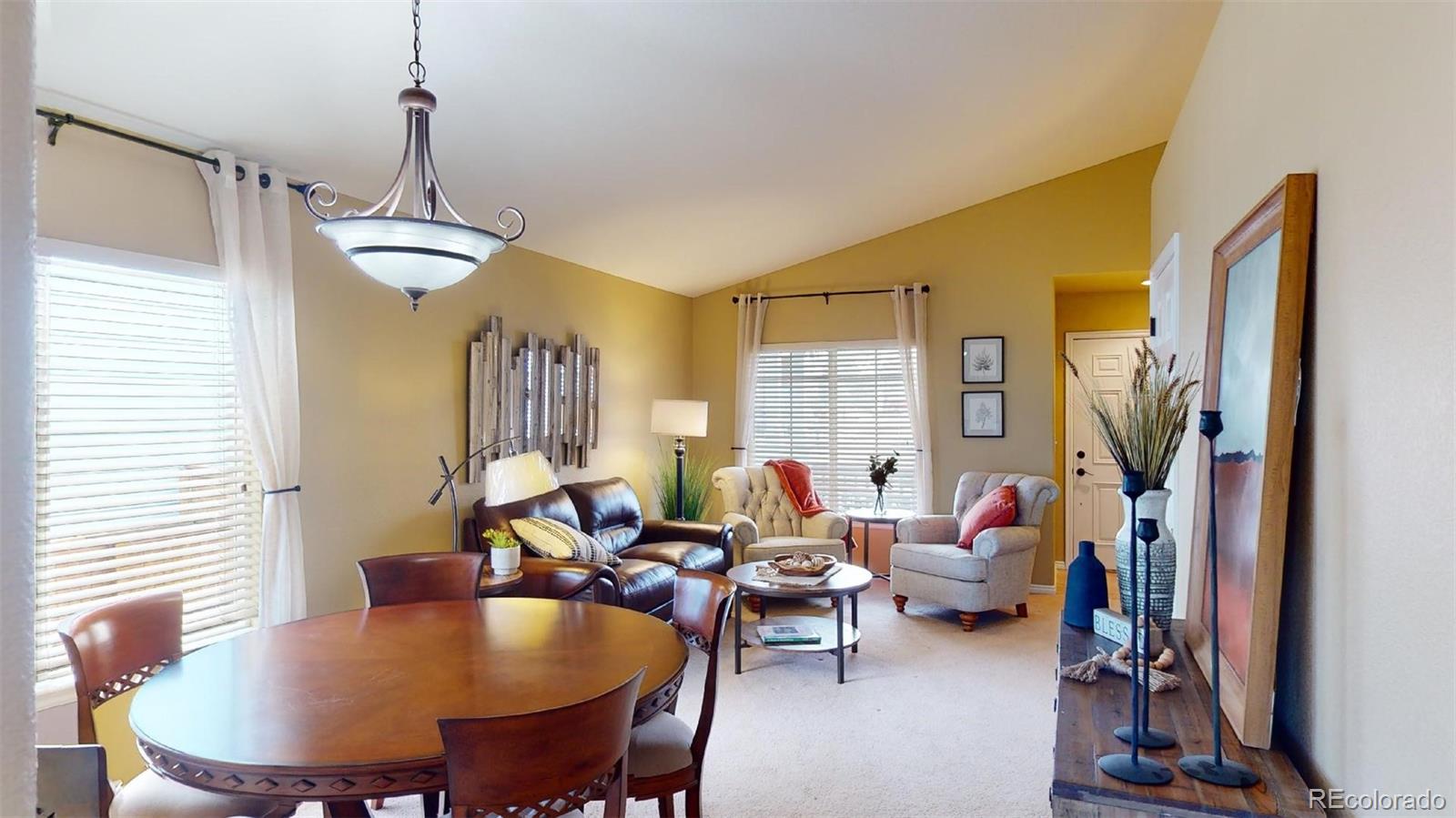 599 Timbervale Trail Highlands Ranch, CO 80129 - Photo 7 of 32 a living room with furniture and a window