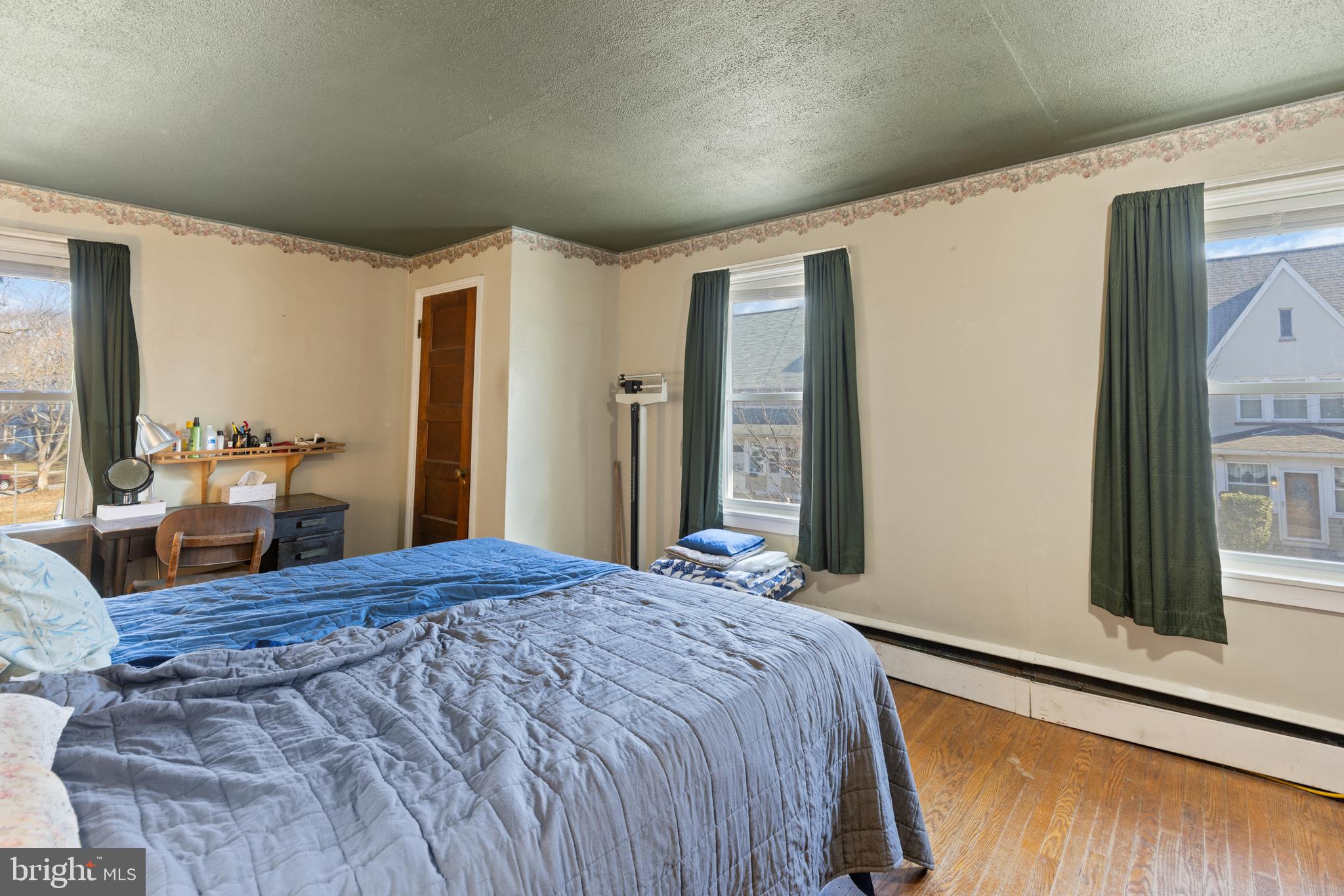 12 Flagship Road Dundalk, MD 21222 - Photo 10 of 19 a bedroom with a large bed and a large window